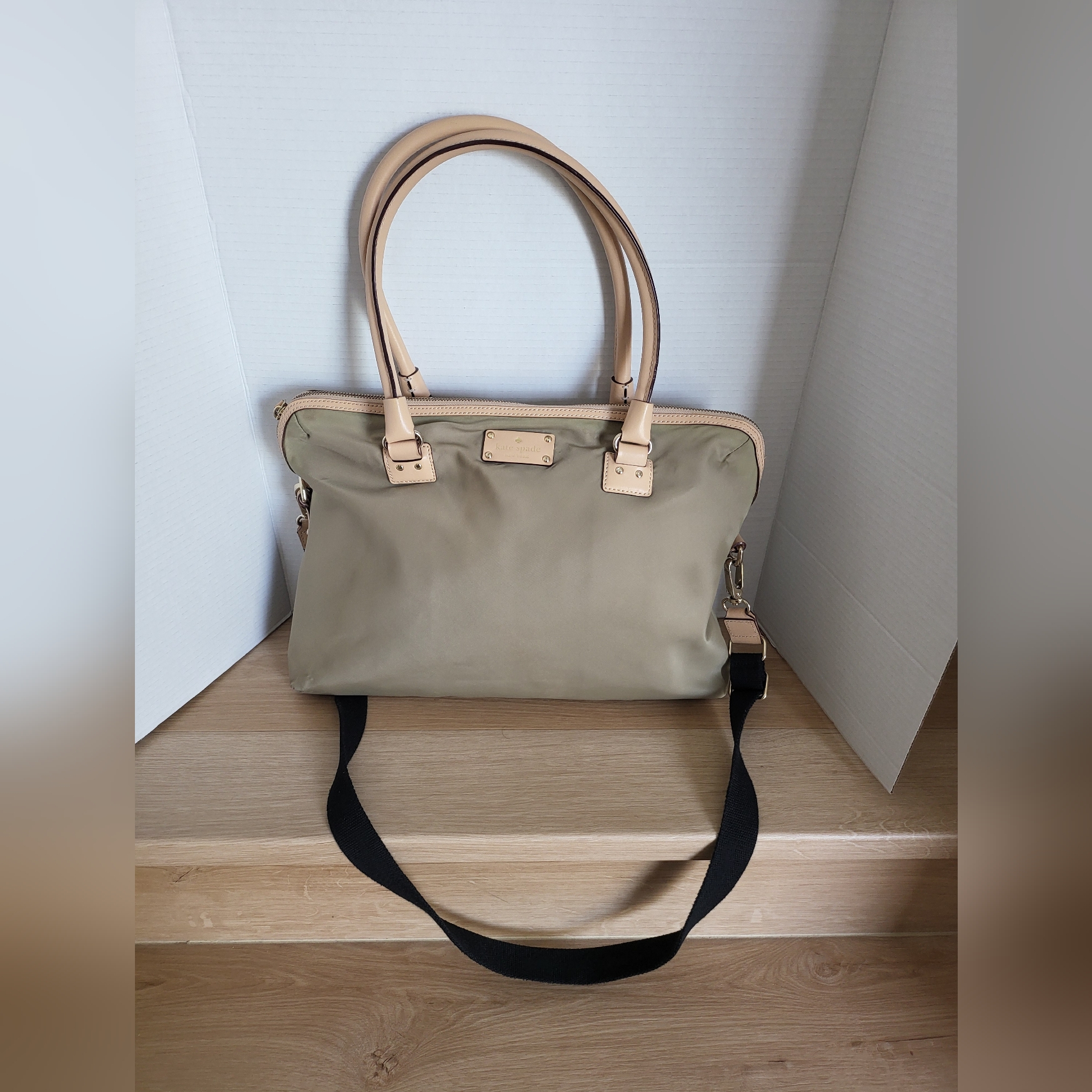 Kate Spade Beige Laptop Bag With Black Strap.